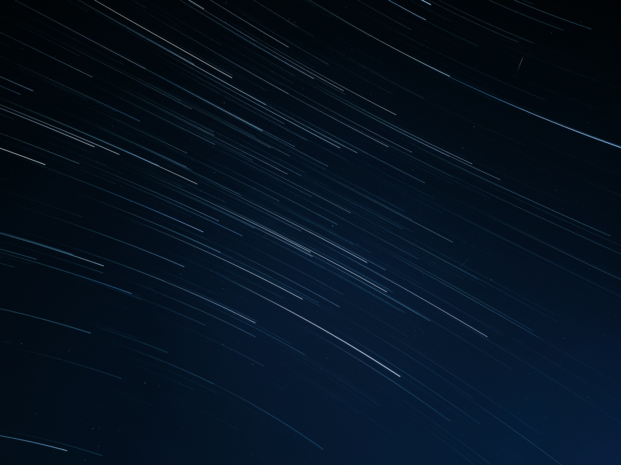 Blurred Motion of Stars in Navy Blue Sky