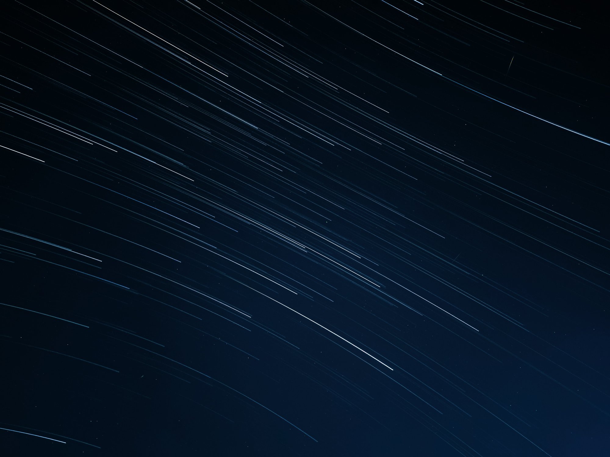 Blurred Motion of Stars in Navy Blue Sky